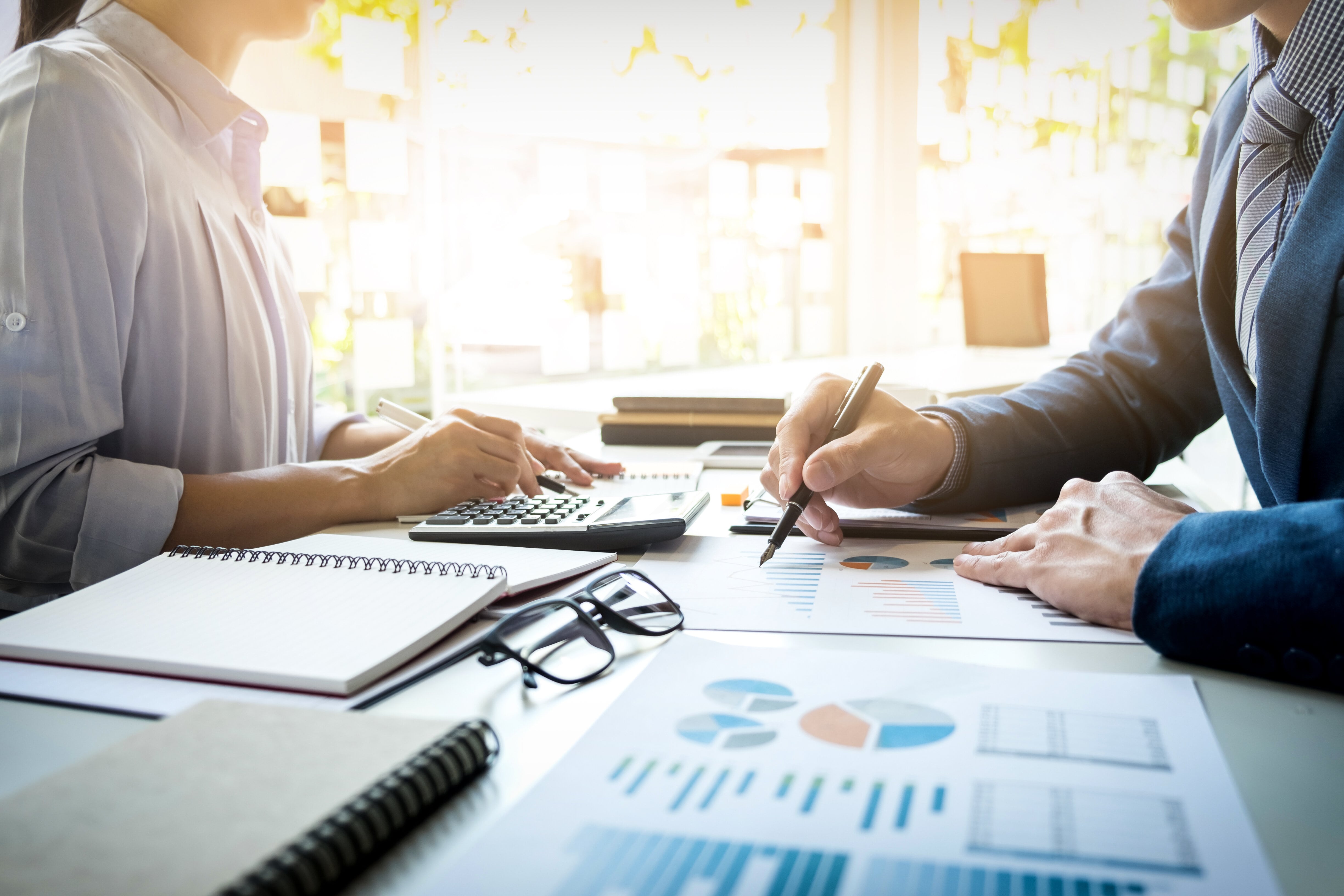 business-man-financial-inspector-and-secretary-making-report-calculating-or-checking-balance-internal-revenue-service-inspector-checking-document-audit-concept (2)